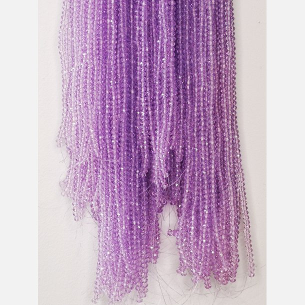 Nr. 1 Lyselilla  Facet slebne glas perler i 4 x 6 mm.