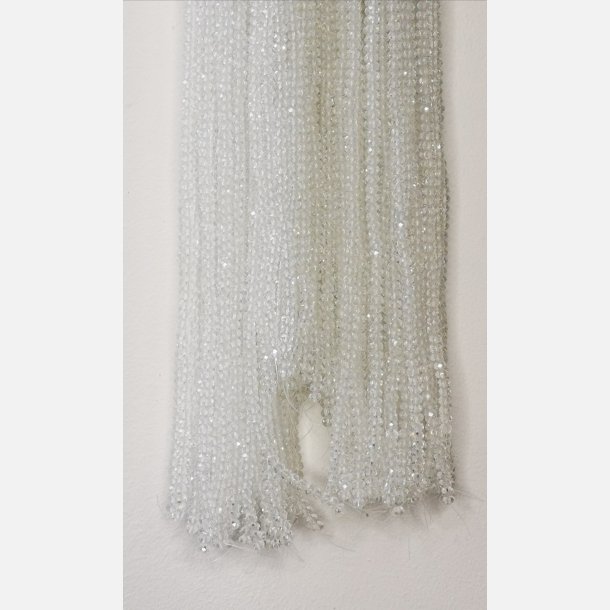 Nr. 3 Gennemsigtig/Glas  Facet slebne glas perler i 4 x 6 mm.