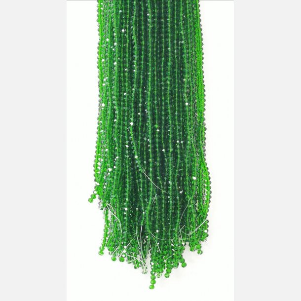 Nr. 7 Stedsegrn Facet slebne glas perler i 4 x 6 mm.